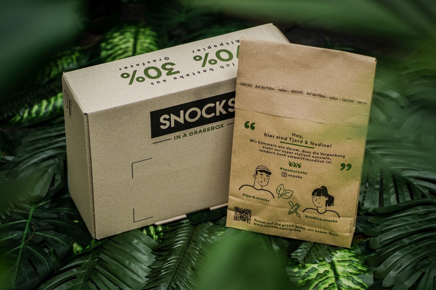 Nachhaltige Verpackungen aus Graspapier bei Snocks - sustainable packaging